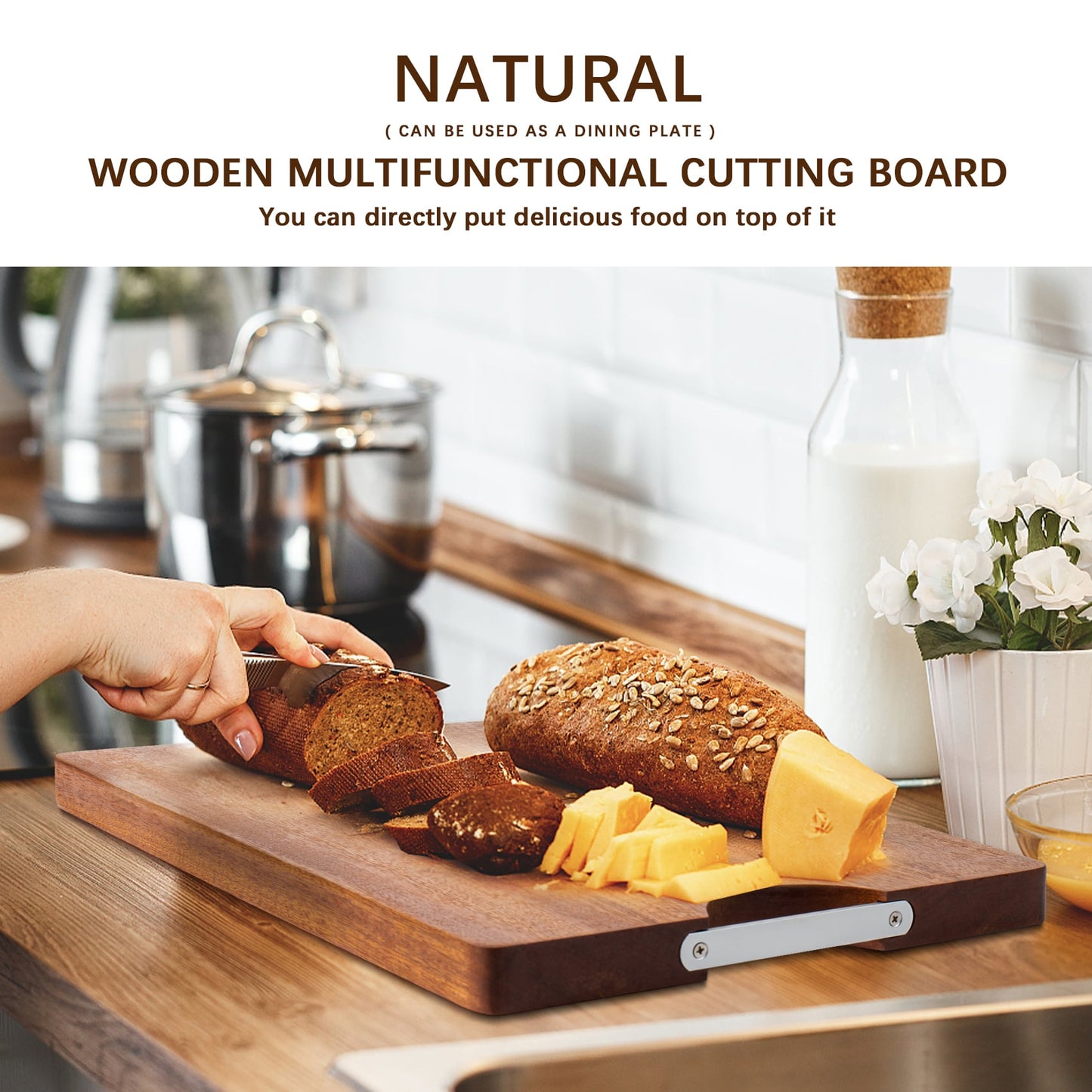 A man cuts a baguette on top of this pure ebony cutting board and prepares it to be eaten with butter