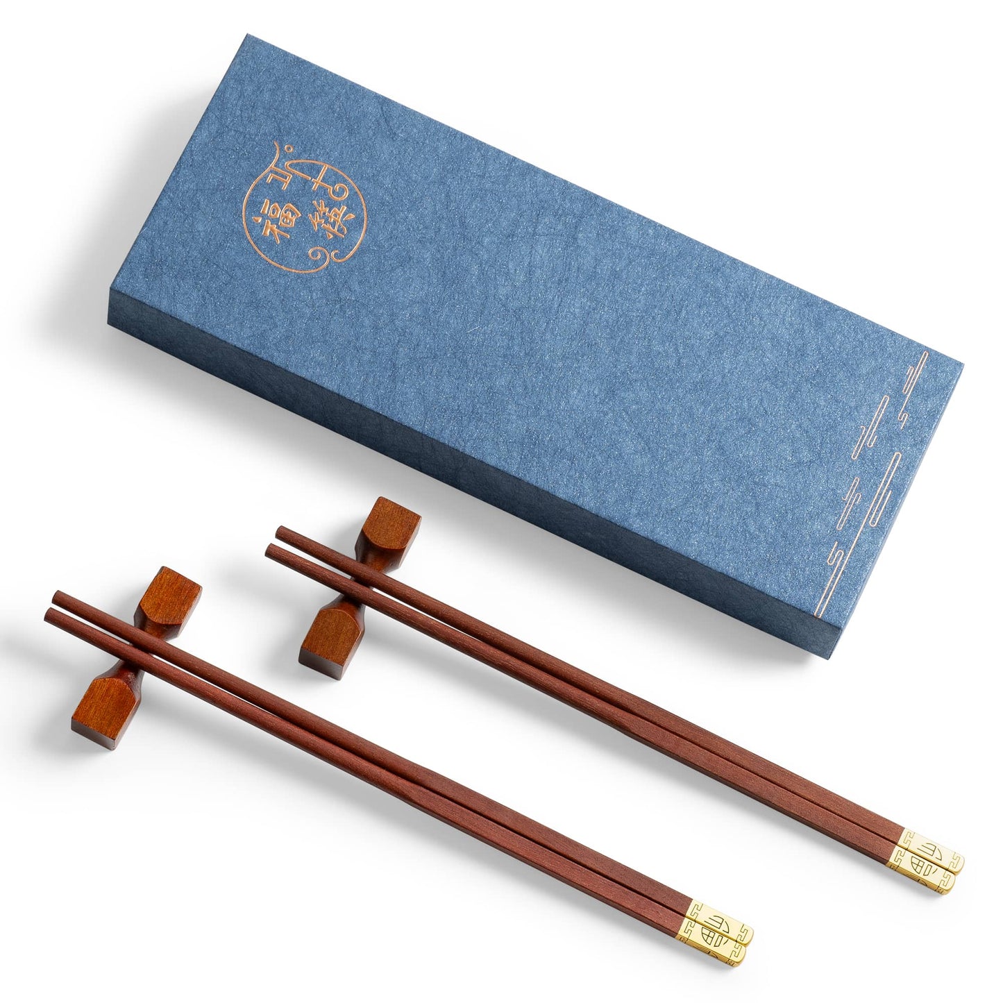 Two gourd-shaped wooden chopstick holders hold two pairs of beautifully crafted natural wood chopsticks next to a gift box