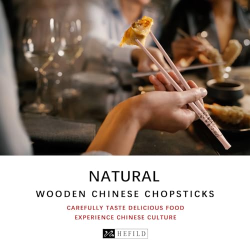A family is enjoying dinner-dumplings with these wooden chopsticks. Carefully taste delicious food experience chinese culture