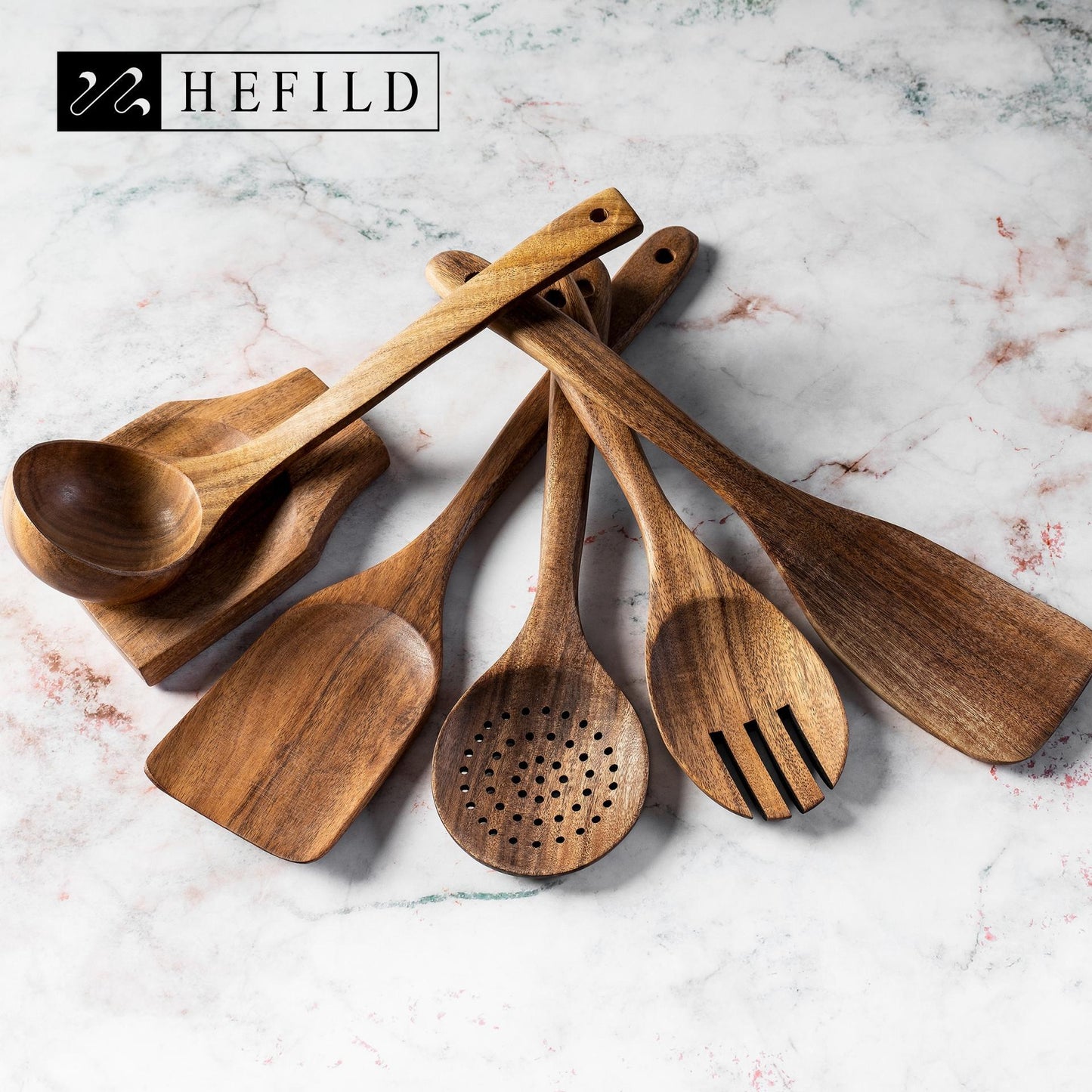 Elegant set of wooden cooking utensils displayed on a marble surface, ideal for modern kitchens