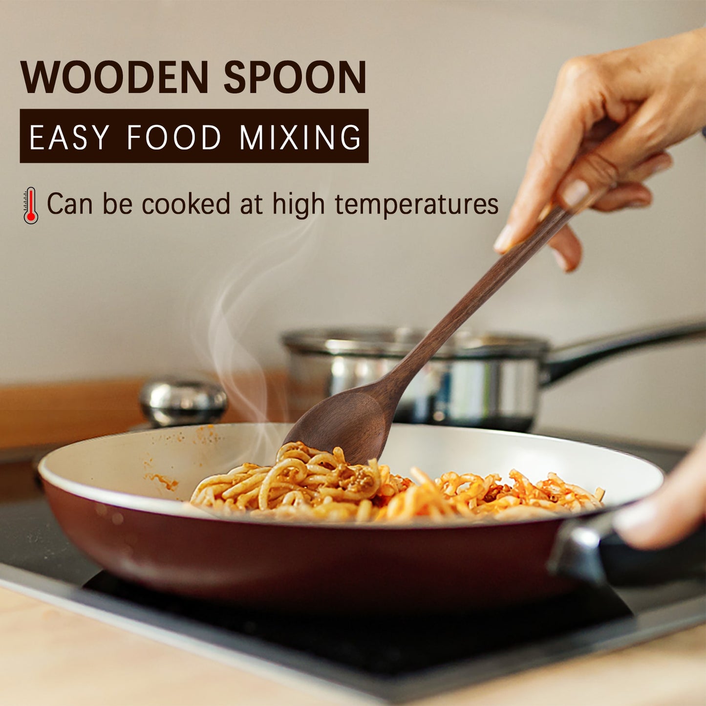 A man is stirring the pasta in a pot with this natural wooden, heat-resistant, long-handled stirring spoon.