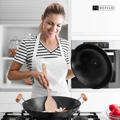 Women use a wooden cooking spatula 13.3 inches in length to stir-fry dishes